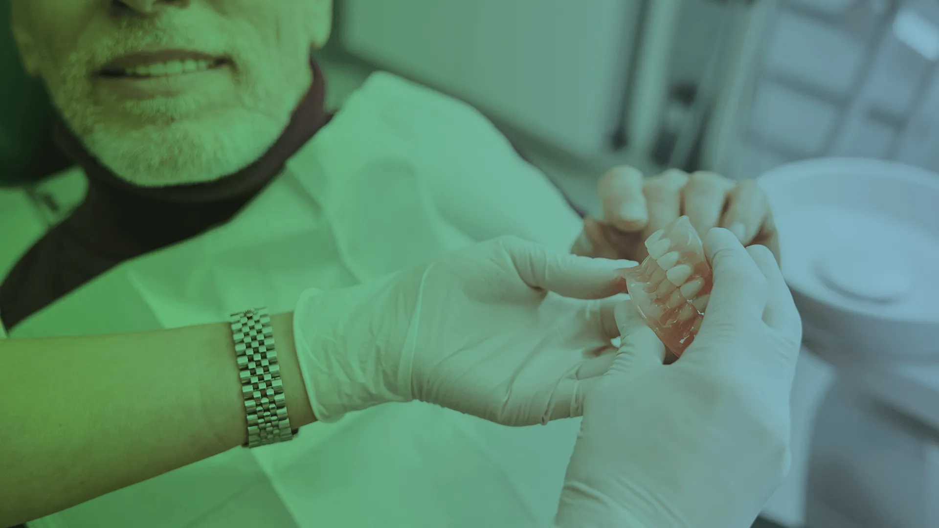 Image of person showing dentures.