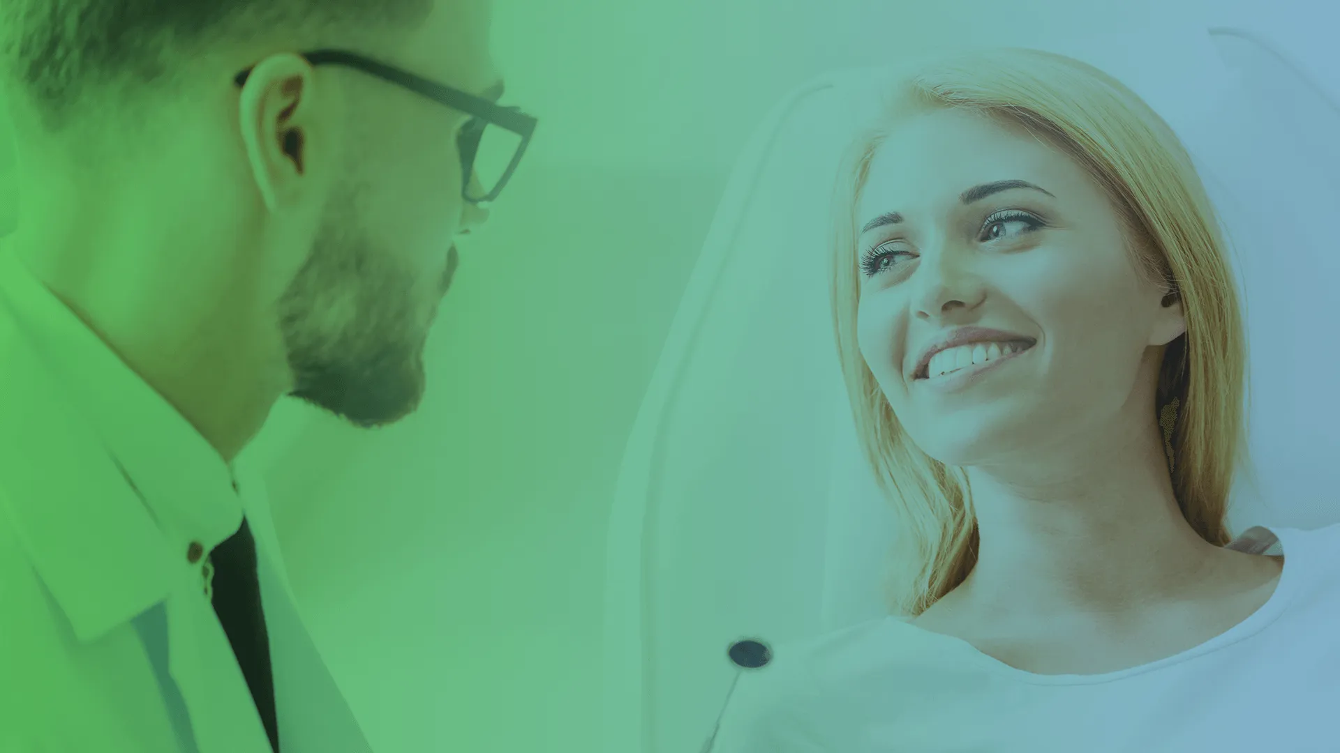 Dentist talking to patient.