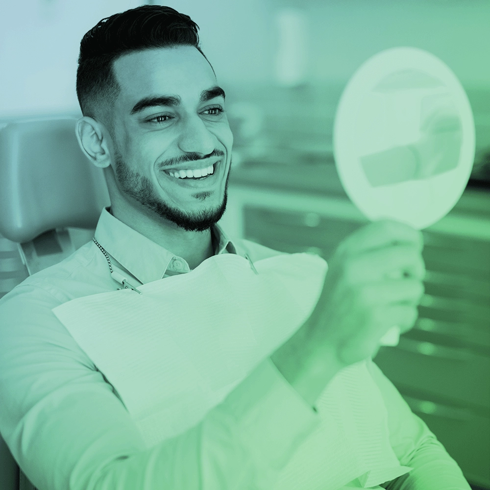 Patient looking in mirror.