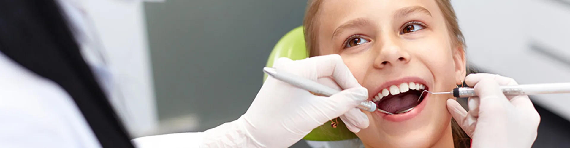 Dentist working on a child patient.