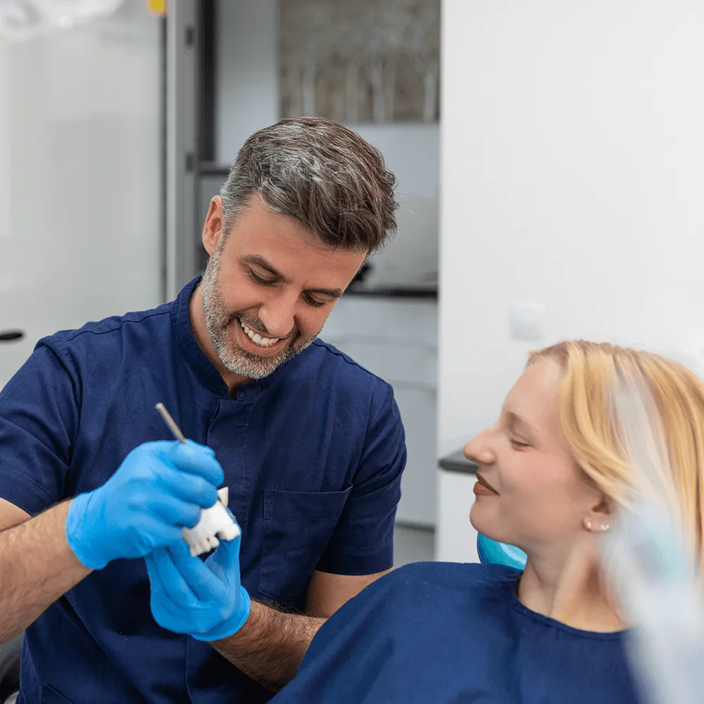 Dentist showing how crowns work.